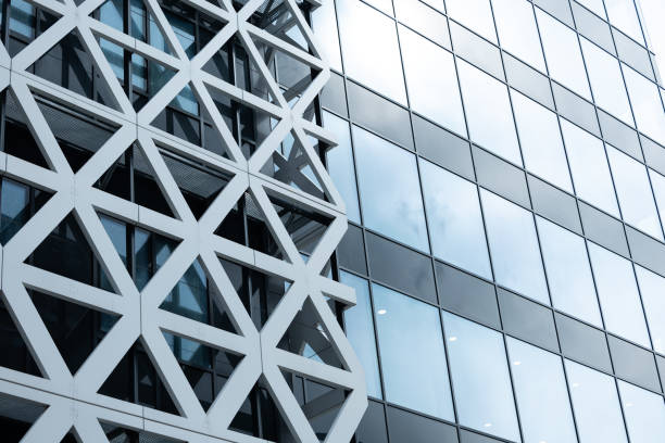 istock Modern Business Building with Glass Facade with Metal Triangles in Luminescent Elegance 2204896192