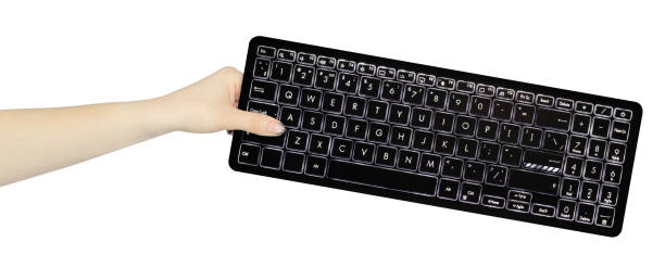 istock keyboard in hand, outstretched hand with keyboard  isolated from background 2204902090