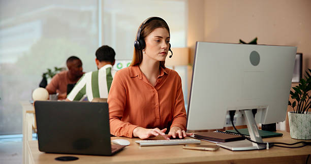 istock Typing, agent or woman on computer for customer service, telecom and contact support research. Laptop, lead generation or virtual assistant with report for inbound sales, call center or questions 2204903130