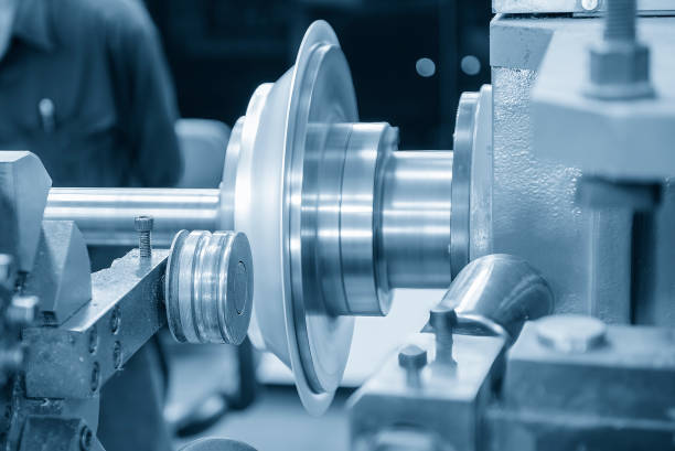 istock Close up scene the metal spinning process by lathe machine in the light blue scene. 2204904230