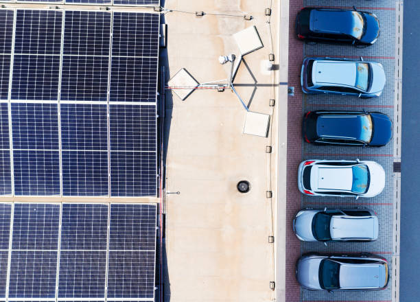 istock Warehouse with solar panels and electric cars. 2204905849