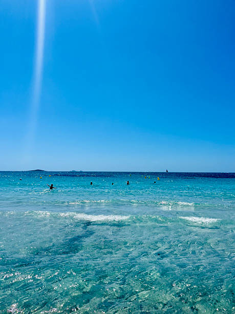 istock Swimmers enjoying the crystal-clear Mediterranean sea 2204906702