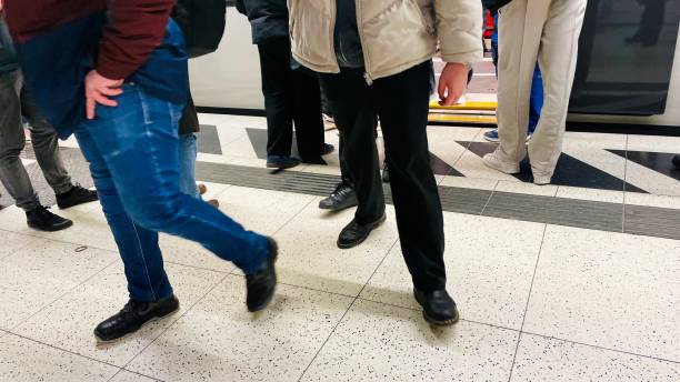 Rush hour in the underground, unrecognizable people walking