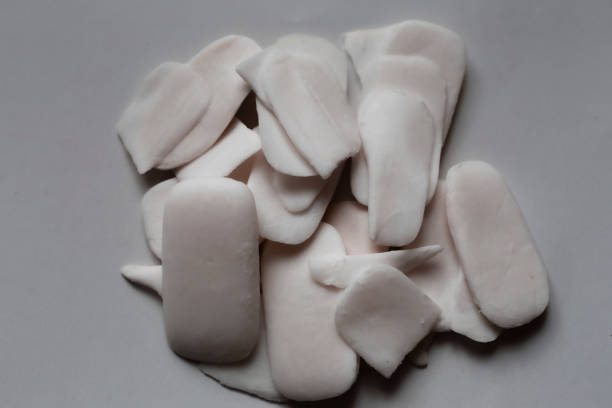 a lot of soap residue lies in a pile creating a mountain