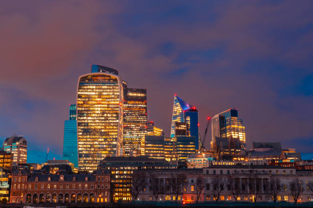 istock Modern skyscrapers dominating the london skyline during twilight 2204909347