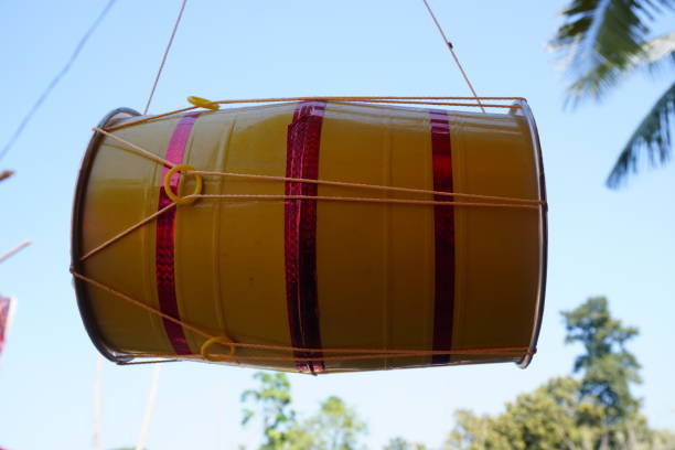istock Dhol a musical drum instrument is hanging from a rod in close up 2204912334