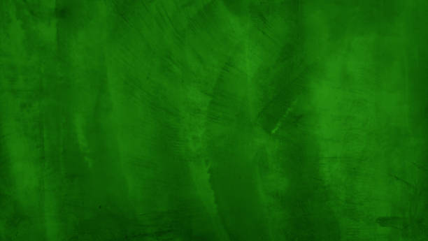 istock This image depicts a close-up of a textured green wall, showcasing a subtle pattern and green tone, suitable for use as a minimalist background, website banner. 2204913802