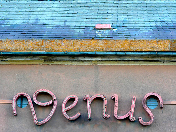 Neon Sign directing foot traffic to historic Printer's Alley near Broadway in Nashville, Tennessee