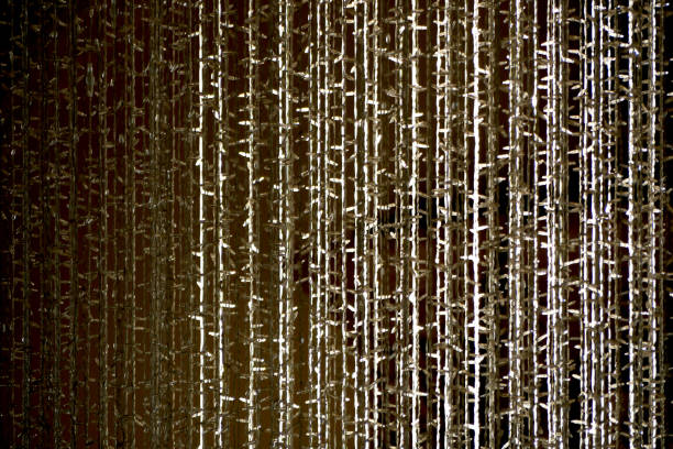 Beige curtain on the window in the room