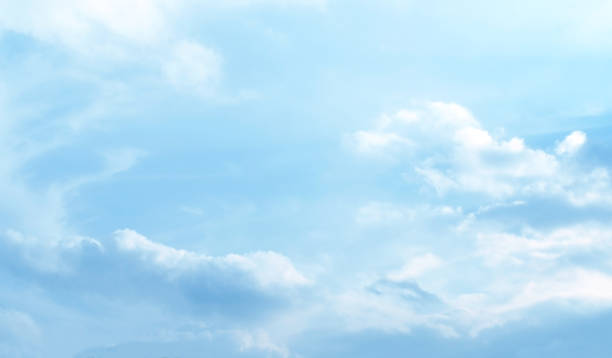 istock Blue pastel sky with white fluffy cloud. Cumulus clouds background. 2204921290
