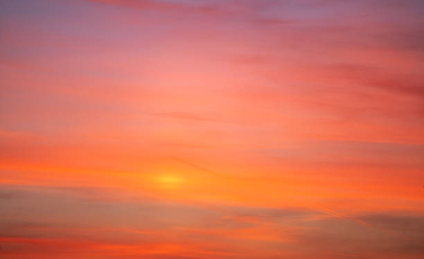 istock Beautiful bright orang sunset sky with dramatic clouds. Sunset sky background. 2204924248