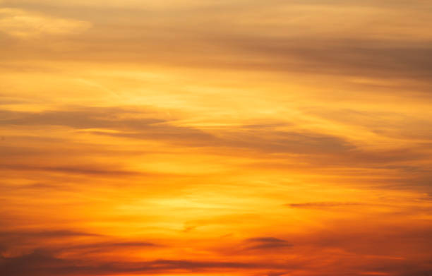 istock Beautiful bright orang sunset sky with dramatic clouds. Sunset sky background. 2204924262