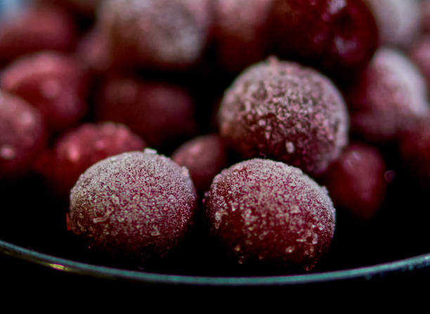 istock frozen cherries are on a saucer in the kitchen 2204925358