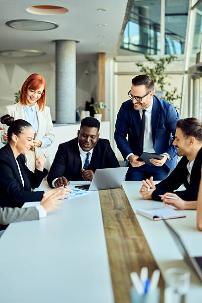 istock Collaborative Business Meeting with Professionals in a Modern Office Setting 2204928720