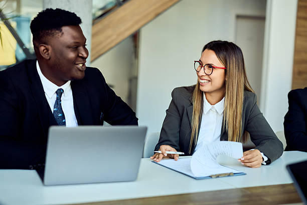 istock Confident Business Professionals Collaborating Together in a Modern Office Environment 2204928732