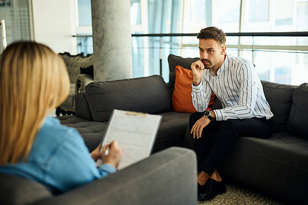 istock Professional Counseling Session Between Therapist and Client in Modern Office Space 2204931381