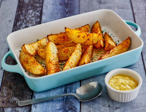 istock Parmesan Potato Wedges 2204936900