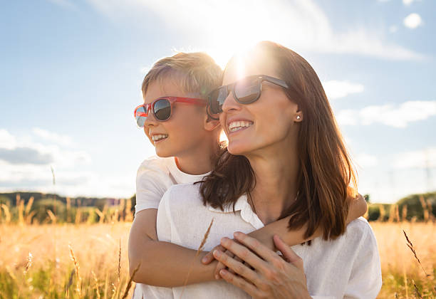 istock Happy mother and son at sunset. 2204942643