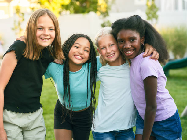 istock Young Girls Having Fun in a Backyard 2204945283