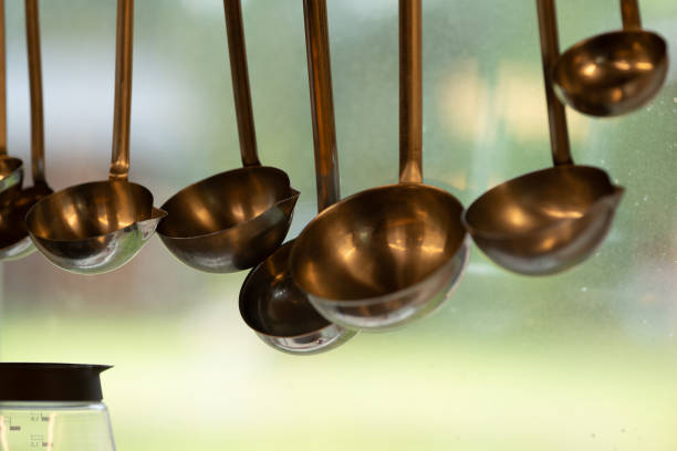Metal scoops hanging in a kitchen