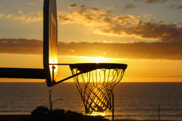 istock Basketball Hoop at Sunset 2204953479