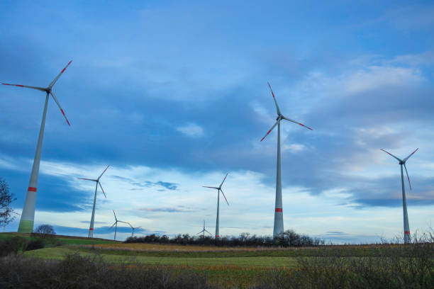 istock power generating wind turbines in the countryside 2204956375