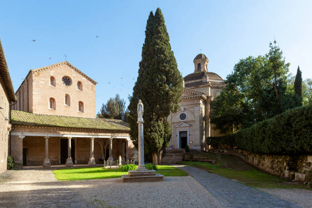 Rome, Italy - March 03, 2025: on the left, the church of Saint Vincent and Saint Anastasius and on the right, the church of the Santa Maria Scala Coeli. Both in the complex of the Three Fountains Abbey.