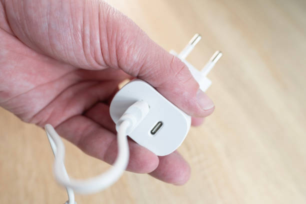 istock White USB charger with both USB-A and USB-C ports, perfect for fast charging multiple devices, convenience and efficiency in device powering, on-the-go multiple universal device 2204960952