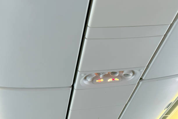 istock modern Airplane cabin interior, overhead panel with seatbelt and call buttons, reading light, call button, and air vent, flight experience, air journey, comfortable travel, airline industry 2204961915