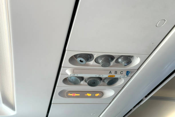 istock modern Airplane cabin interior, overhead panel with seatbelt and call buttons, reading light, call button, and air vent, flight experience, air journey, comfortable travel, airline industry 2204961928
