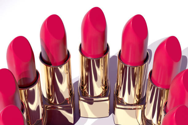 istock set Luxurious golden lipsticks scattered on light background, elegance and beauty in cosmetics, Beauty industry glamour, 3d render 2204961973