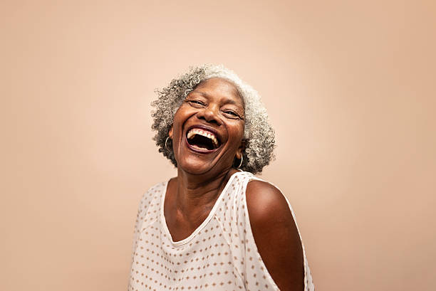 istock Radiant Senior Woman Laughing with Joy and Positivity 2204968049