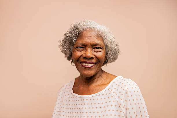 istock Smiling Senior Woman with a Warm and Friendly Expression 2204968067