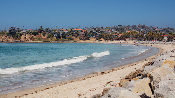 istock Gentle waves on San Pedro beach under warm sunlight 2204973282