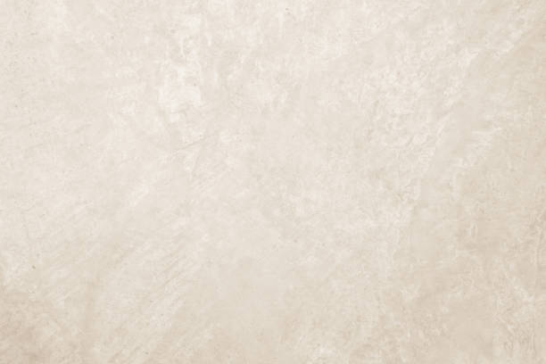 istock Colour old concrete wall texture background. Close up retro plain cream color cement wall background texture. Design paper vintage parchment element. 2204976254