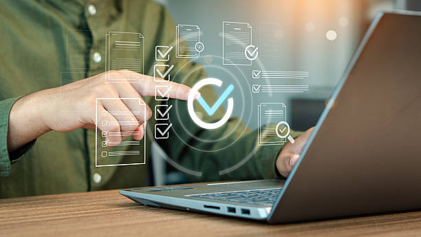istock Man finger touch check mark, digital documents and files hologram. Copy space, business process approval documents, quality, confirmation, check, validation, approval, checkbox 2204980519