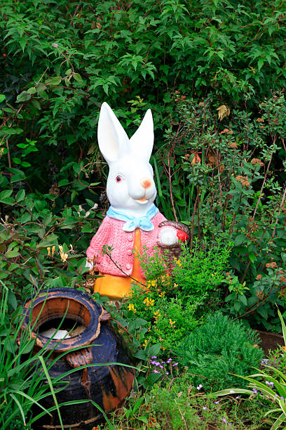 sculptures of rabbit models in the garden