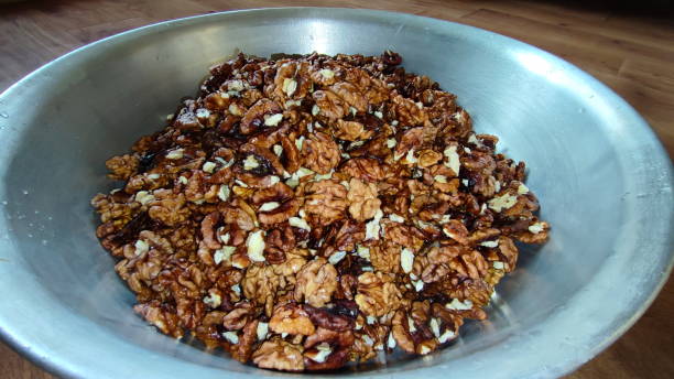 istock The photographs show many walnuts. 2204992899