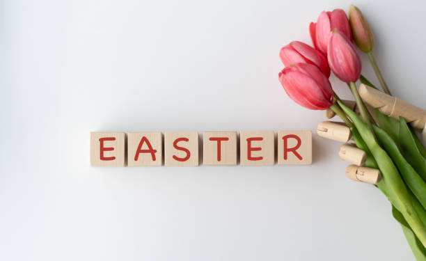 istock Easter is written in blocks on a white background 2204992962