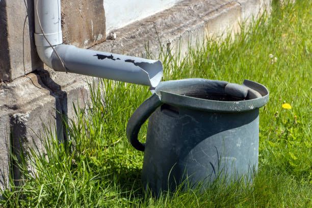 istock A full tank of rainwater under the gutter 2205006731