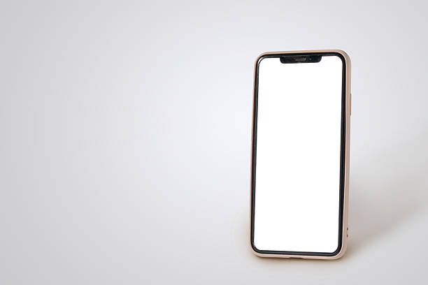 istock A phone with a white screen sits on a white background. The phone is on its side. The phone is a silver color 2205016858