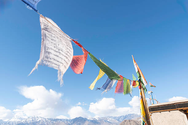istock Tibetan prayer flags  Close view of prayers flags 2205017512