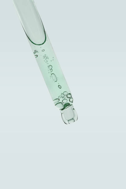 istock Pipette with transparent anti-aging serum inside 2205022561