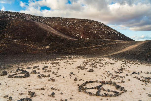 istock Peace Sign Inside Amboy Crater 2205025659