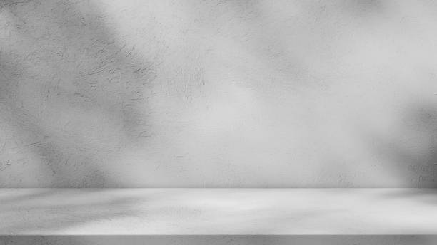 istock Empty gray wall room and shadow light overlay interior studio concrete backdrop and floor cement shelf, well editing montage display products and text present on free space grey color backgrounds 2205026846
