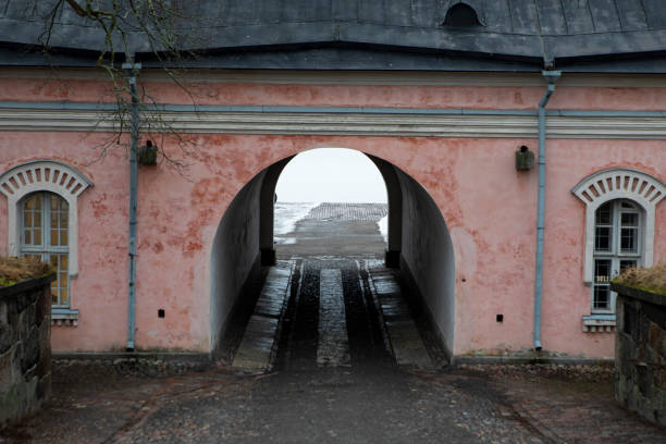 Jetty Barracks in Suomenlinna. Suomenlinna is a sea fortress comprising eight islands, about 4 km southeast of the Helsinki city centre. It became a UNESCO World Heritage Site in 1991.