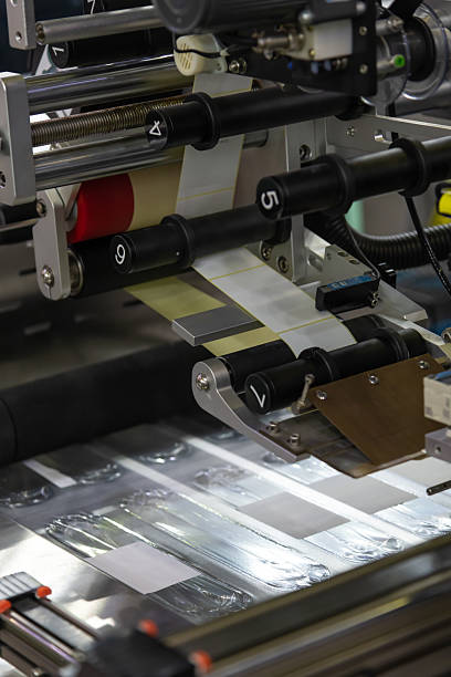 istock Industrial printing process in action inside a busy manufacturing facility 2205034767