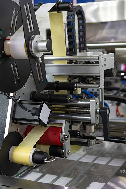 istock Industrial machinery for precision labeling in production line operations 2205034802