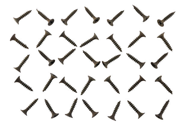 Background of black screws on a white background. Pattern of screws.
