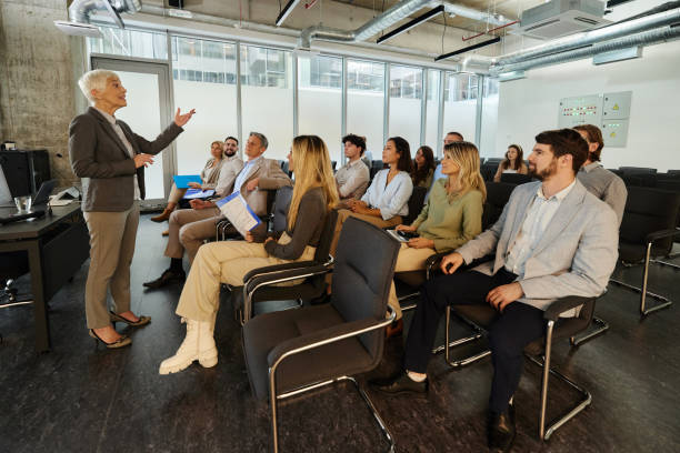istock Business seminar in board room! 2205039279